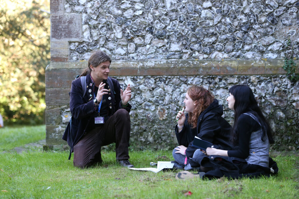 University of Brighton lecturer Craig Jordan Baker with Creative Writing and Media Students at Stanmer Church. 24 Sep 2018